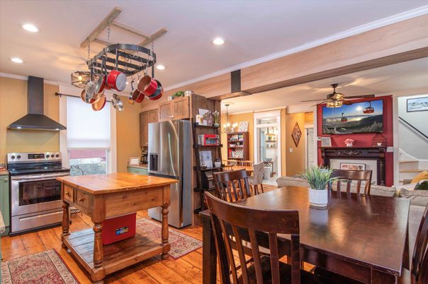 Dining room, Interior, Kitchen, Pendant Lights, Recessed Lighting, Stainless Steel Appliances, Wood Texture Flooring