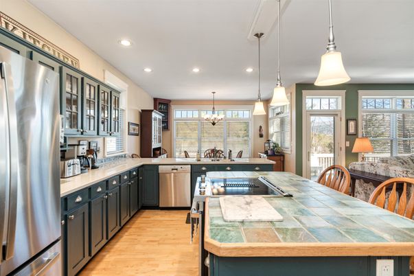 Chandelier, Interior, Kitchen, Pendant Lights, Recessed Lighting, Stainless Steel Appliances, Tile Countertops, Wood Texture Flooring