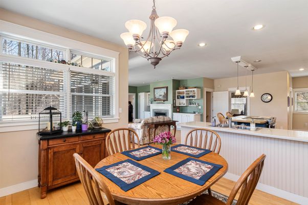 Chandelier, Dining room, Fireplace, Interior, Pendant Lights, Recessed Lighting, Wood Texture Flooring