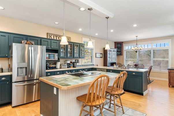 Chandelier, Interior, Kitchen, Pendant Lights, Recessed Lighting, Stainless Steel Appliances, Wood Texture Flooring