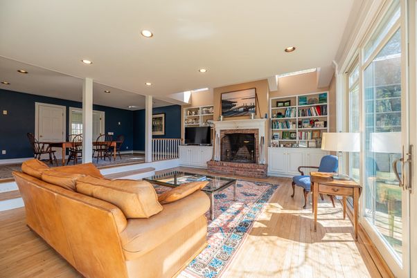 Dining room, Fireplace, Interior, Living room, Recessed Lighting, Wood Texture Flooring
