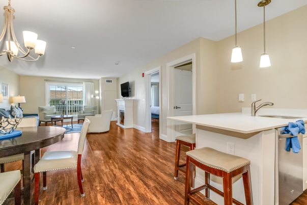 Dining room, Fireplace, Interior, Living room, Pendant Lights, Recessed Lighting, Wood Texture Flooring