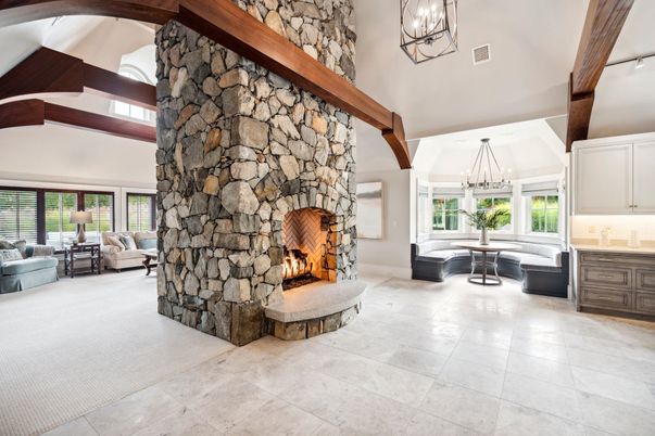 Chandelier, Fireplace, Interior, Living room, Pendant Lights, Stone Walls, Wooden Beams