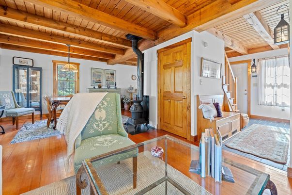 Dining room, Fireplace, Interior, Living room, Pendant Lights, Wooden Beams, Wooden Ceilings, Wood Texture Flooring