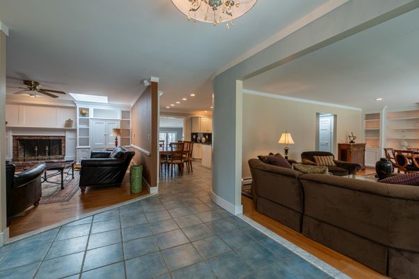 Dining room, Fireplace, Interior, Living room, Recessed Lighting, Wood Texture Flooring