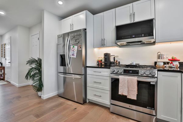 Interior, Kitchen, Recessed Lighting, Stainless Steel Appliances, Wood Texture Flooring