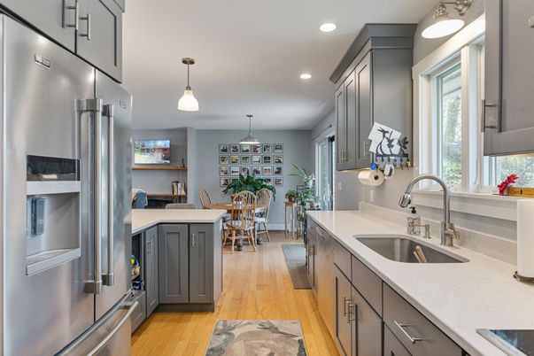 Dining room, Interior, Kitchen, Pendant Lights, Recessed Lighting, Stainless Steel Appliances, Wood Texture Flooring