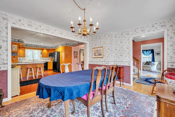 Chandelier, Dining room, Interior, Kitchen, Stainless Steel Appliances, Wood Texture Flooring
