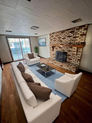 Fireplace, Interior, Living room, Stone Walls, Water, Wood Texture Flooring