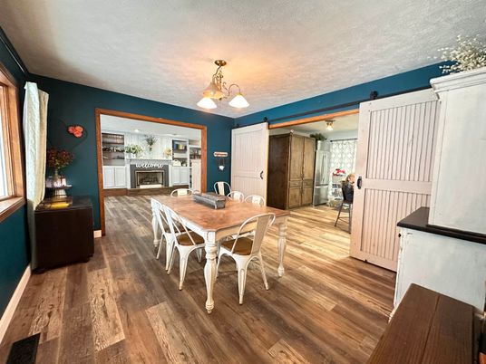 Dining room, Fireplace, Interior, Wood Texture Flooring