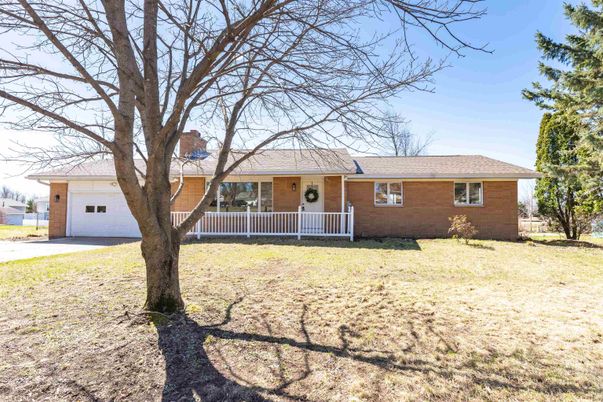Attached, Backyard, Exterior, Facade, Brick Facade, Ranch