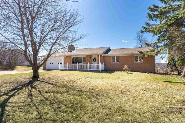 Attached, Backyard, Exterior, Facade, Brick Facade, Cape Cod