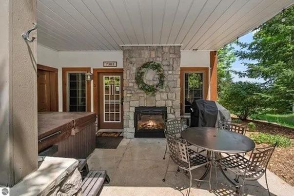 Exterior, Fireplace, Hot Tub