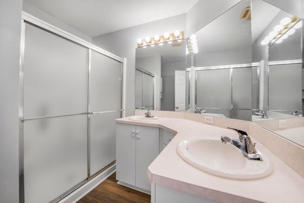 Bathroom, Dual Sink Vanities, Glass Shower, Interior, Wood Texture Flooring