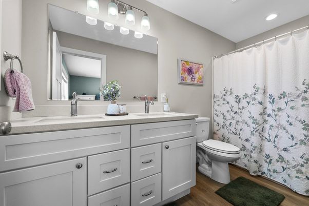 Bathroom, Dual Sink Vanities, Interior, Recessed Lighting, Wood Texture Flooring