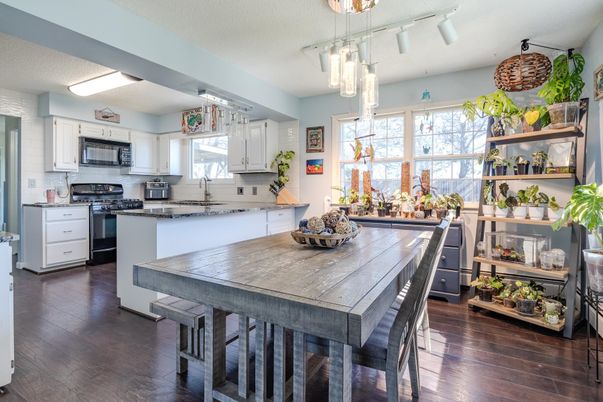 Dining room, Interior, Kitchen, Pendant Lights, Stainless Steel Appliances, Wood Texture Flooring