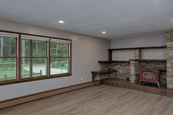 Fireplace, Interior, Recessed Lighting, Stone Walls, Wood Texture Flooring