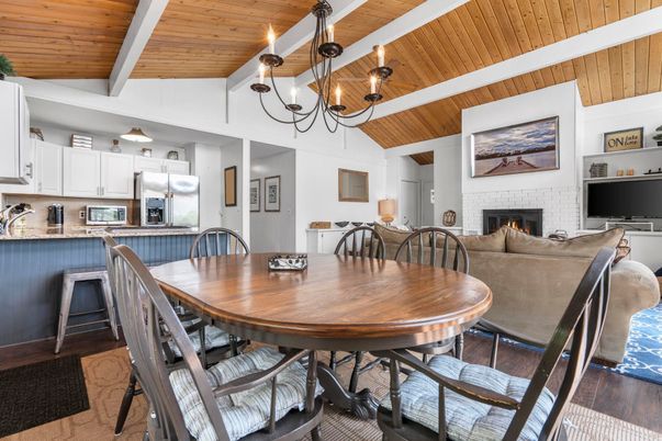 Chandelier, Dining room, Fireplace, Interior, Kitchen, Living room, Stainless Steel Appliances, Wooden Ceilings, Wood Texture Flooring