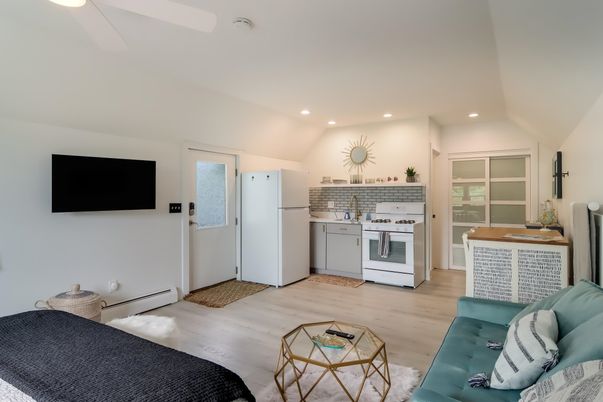 Interior, Kitchen, Recessed Lighting, Washer, Wood Texture Flooring