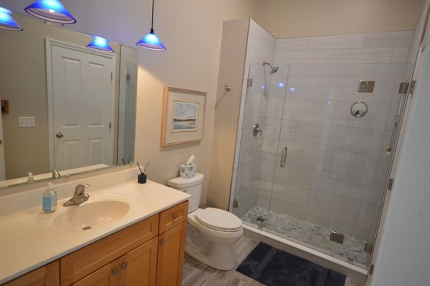 Bathroom, Glass Shower, Interior, Pendant Lights, Wood Texture Flooring
