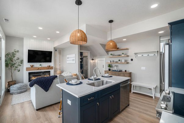 Fireplace, Interior, Kitchen, Living room, Pendant Lights, Recessed Lighting, Stainless Steel Appliances, Wood Texture Flooring