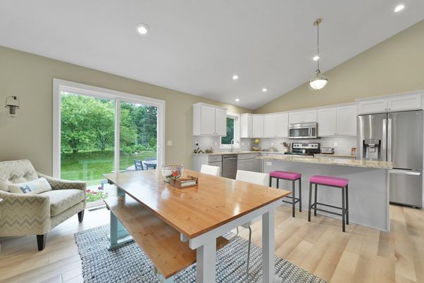 Dining room, Interior, Kitchen, Pendant Lights, Recessed Lighting, Stainless Steel Appliances, Wood Texture Flooring