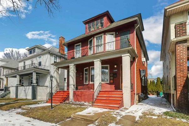 Exterior, Facade, Brick Facade, American Foursquare