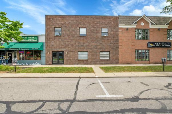 Exterior, Facade, Brick Facade, Condo Building