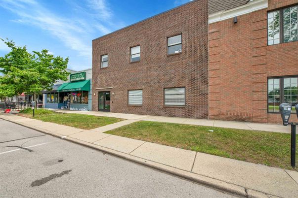 Exterior, Facade, Brick Facade, Condo Building