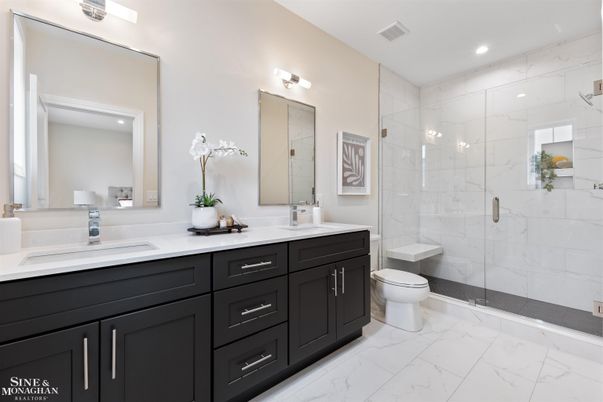 Bathroom, Dual Sink Vanities, Glass Shower, Interior, Marble, Marble Walls, Recessed Lighting