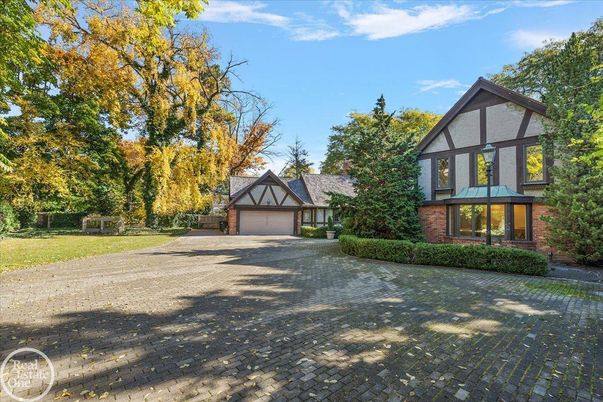 Attached, Backyard, Detached Garage, Exterior, Facade, Brick Facade, Tudor Revival