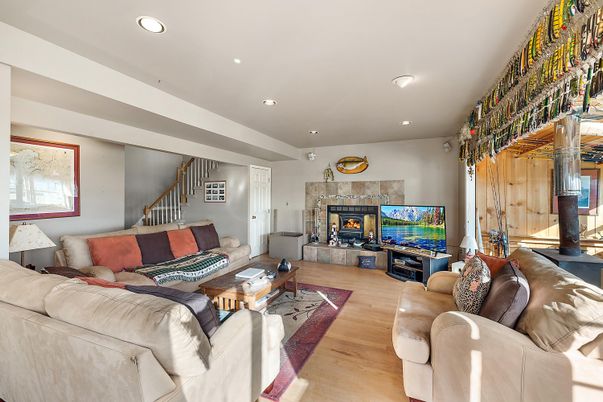 Fireplace, Interior, Living room, Recessed Lighting, Wood Texture Flooring