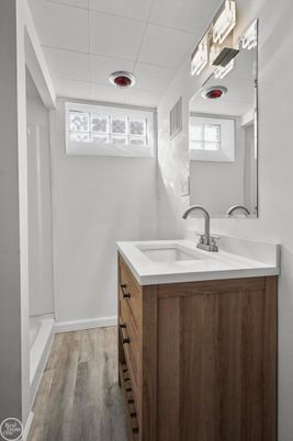 Bathroom, Dual Sink Vanities, Interior, Pendant Lights, Wood Texture Flooring