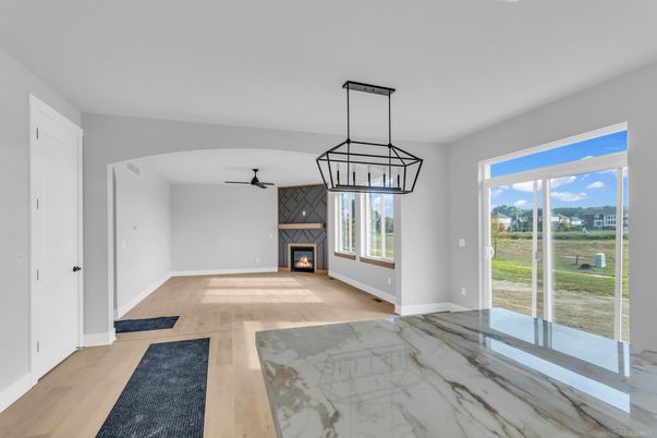 Empty room, Fireplace, Interior, Pendant Lights, Wood Texture Flooring