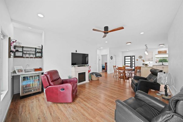 Dining room, Fireplace, Interior, Kitchen, Living room, Pendant Lights, Recessed Lighting, Wood Texture Flooring