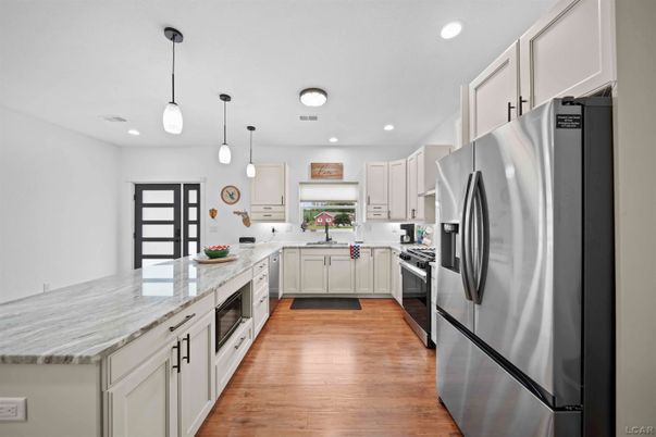 Interior, Kitchen, Pendant Lights, Recessed Lighting, Stainless Steel Appliances, Wood Texture Flooring