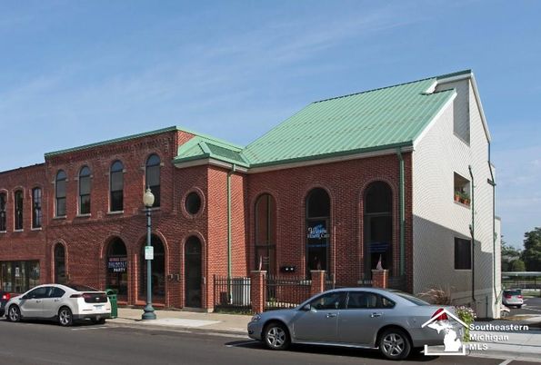 Exterior, Facade, Brick Facade, Condo Building