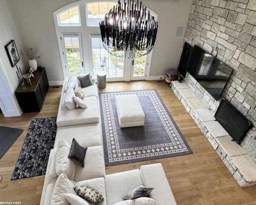 Fireplace, Interior, Living room, Pendant Lights, Stone Walls, Wood Texture Flooring