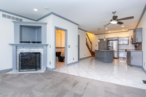 Fireplace, Interior, Kitchen, Marble, Pendant Lights, Recessed Lighting, Stainless Steel Appliances