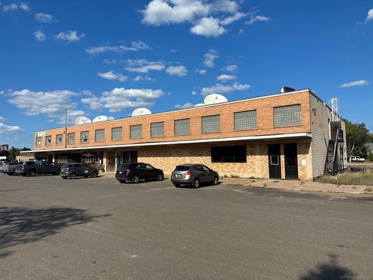 Exterior, Facade, Brick Facade, Condo Building