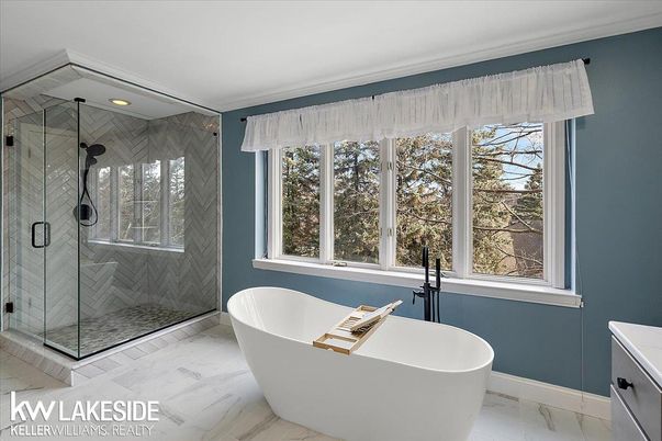 Bathroom, Free Standing Baths, Glass Shower, Interior, Marble, Marble Walls, Recessed Lighting