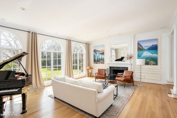 Fireplace, Interior, Living room, Piano, Recessed Lighting, Wood Texture Flooring
