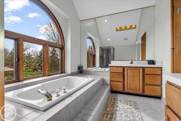 Bathroom, Dual Sink Vanities, Interior, Recessed Lighting, Tile Countertops