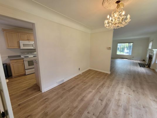 Chandelier, Empty room, Fireplace, Interior, Kitchen, Wood Texture Flooring