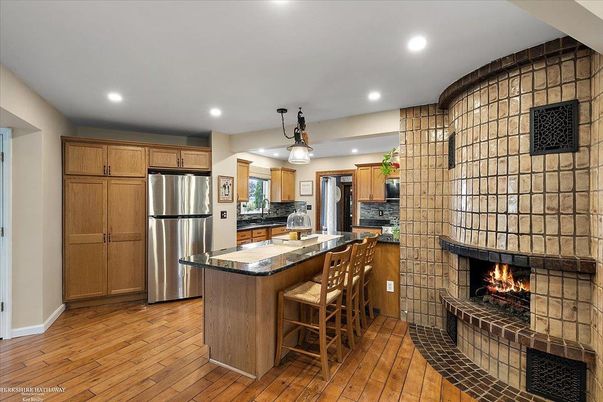 Fireplace, Interior, Kitchen, Pendant Lights, Recessed Lighting, Stainless Steel Appliances, Wood Texture Flooring