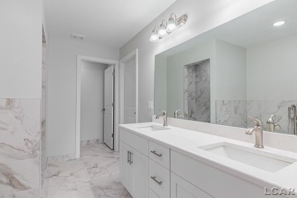 Bathroom, Dual Sink Vanities, Interior, Marble, Marble Walls, Recessed Lighting
