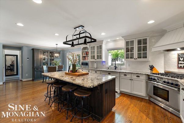 Chandelier, Dining room, Interior, Kitchen, Pendant Lights, Recessed Lighting, Stainless Steel Appliances, Wood Texture Flooring
