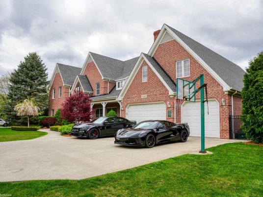 Attached, Exterior, Facade, Brick Facade, Tudor Revival