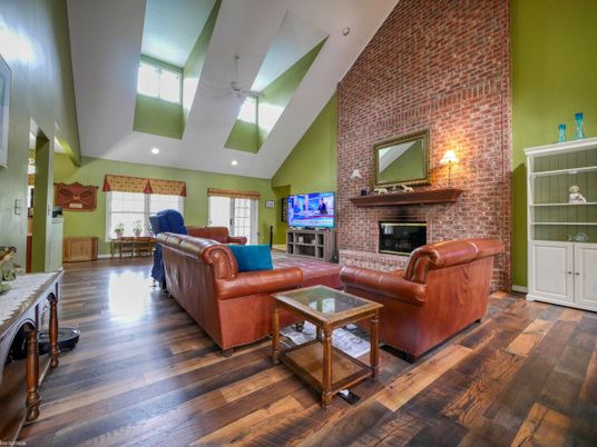 Fireplace, Interior, Living room, Recessed Lighting, Stone Walls, Wood Texture Flooring
