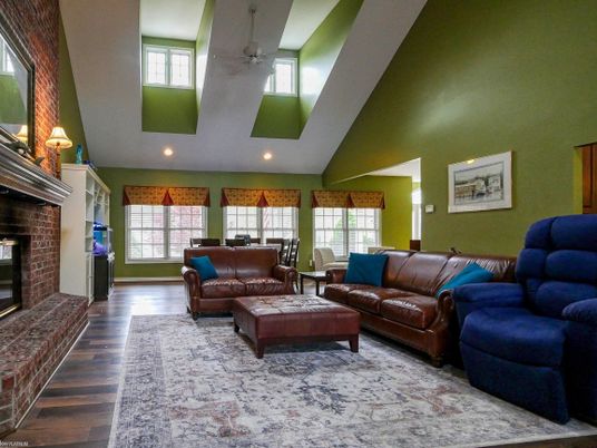 Fireplace, Interior, Living room, Recessed Lighting, Stone Walls, Wood Texture Flooring
